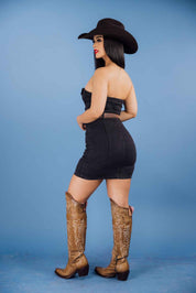 This black denim strapless tube top mini dress has a bodycon fit with a belt-waisted design