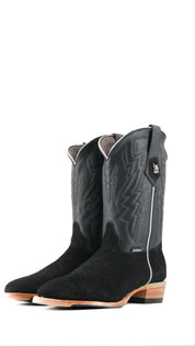 The Maverick boots feature a black suede vamp, black shaft, round toe, sturdy leather sole, and rubber heel.