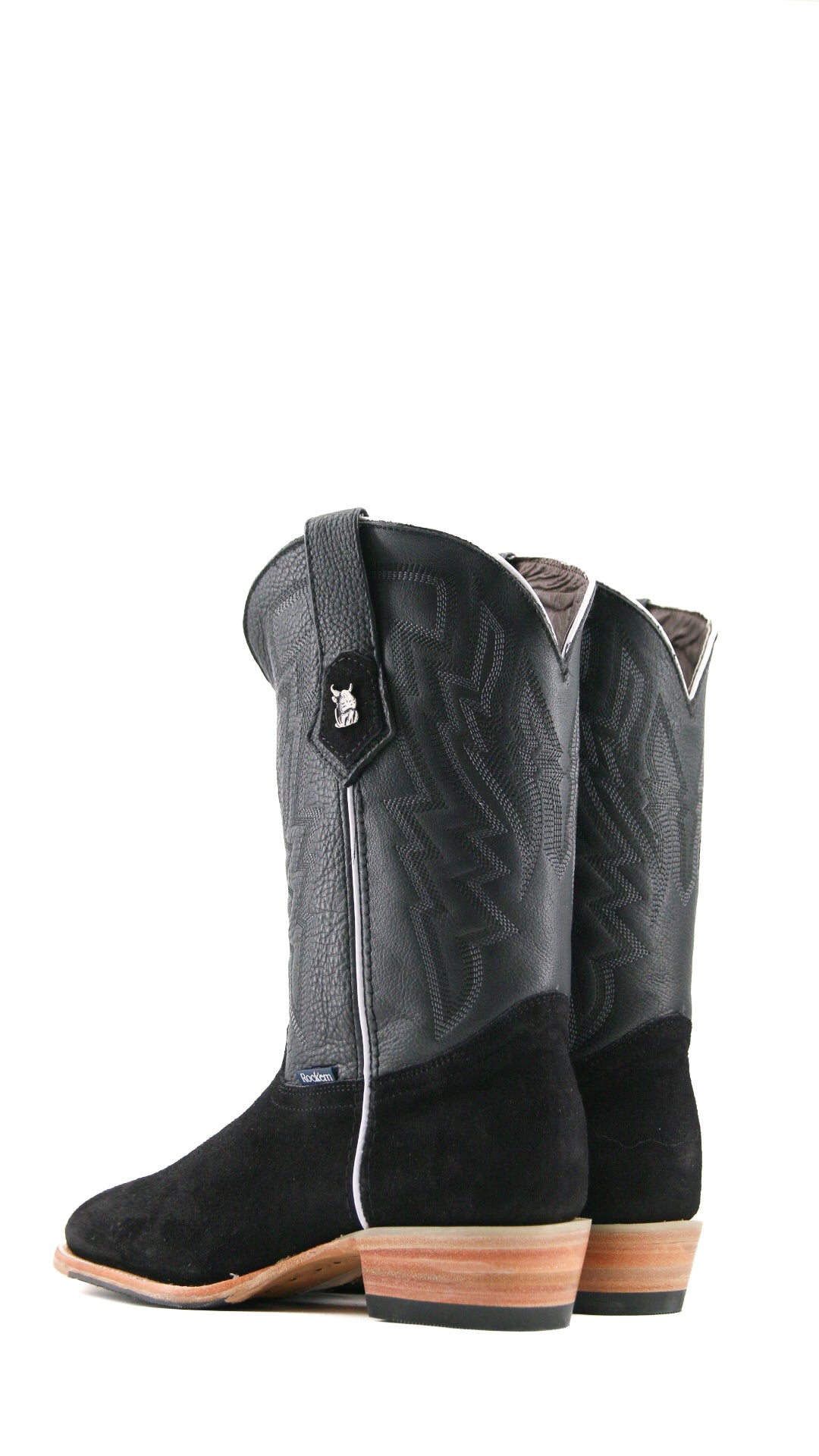 Back view of the Maverick boots feature a black suede vamp, black shaft, round toe, sturdy leather sole, and rubber heel.