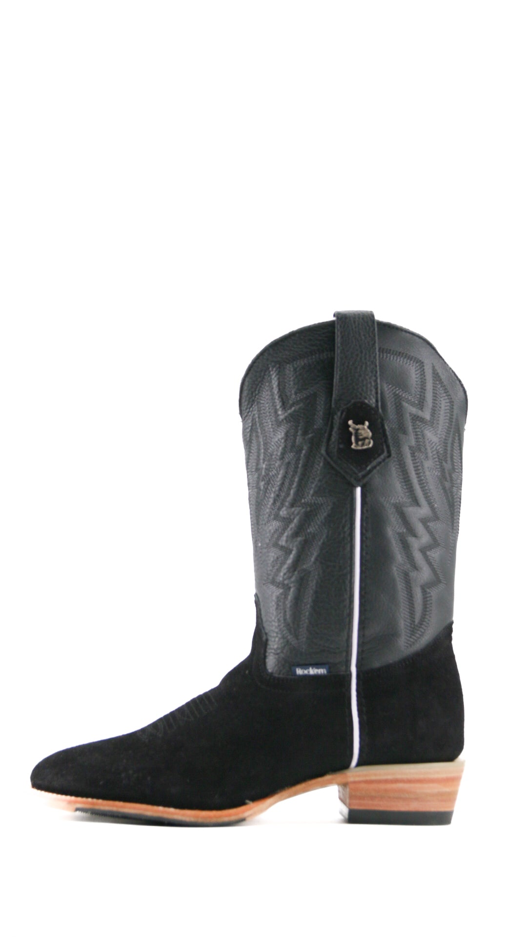Side view of the Maverick boots feature a black suede vamp, black shaft, round toe, sturdy leather sole, and rubber heel.