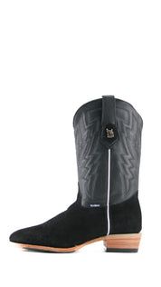 Side view of the Maverick boots feature a black suede vamp, black shaft, round toe, sturdy leather sole, and rubber heel.