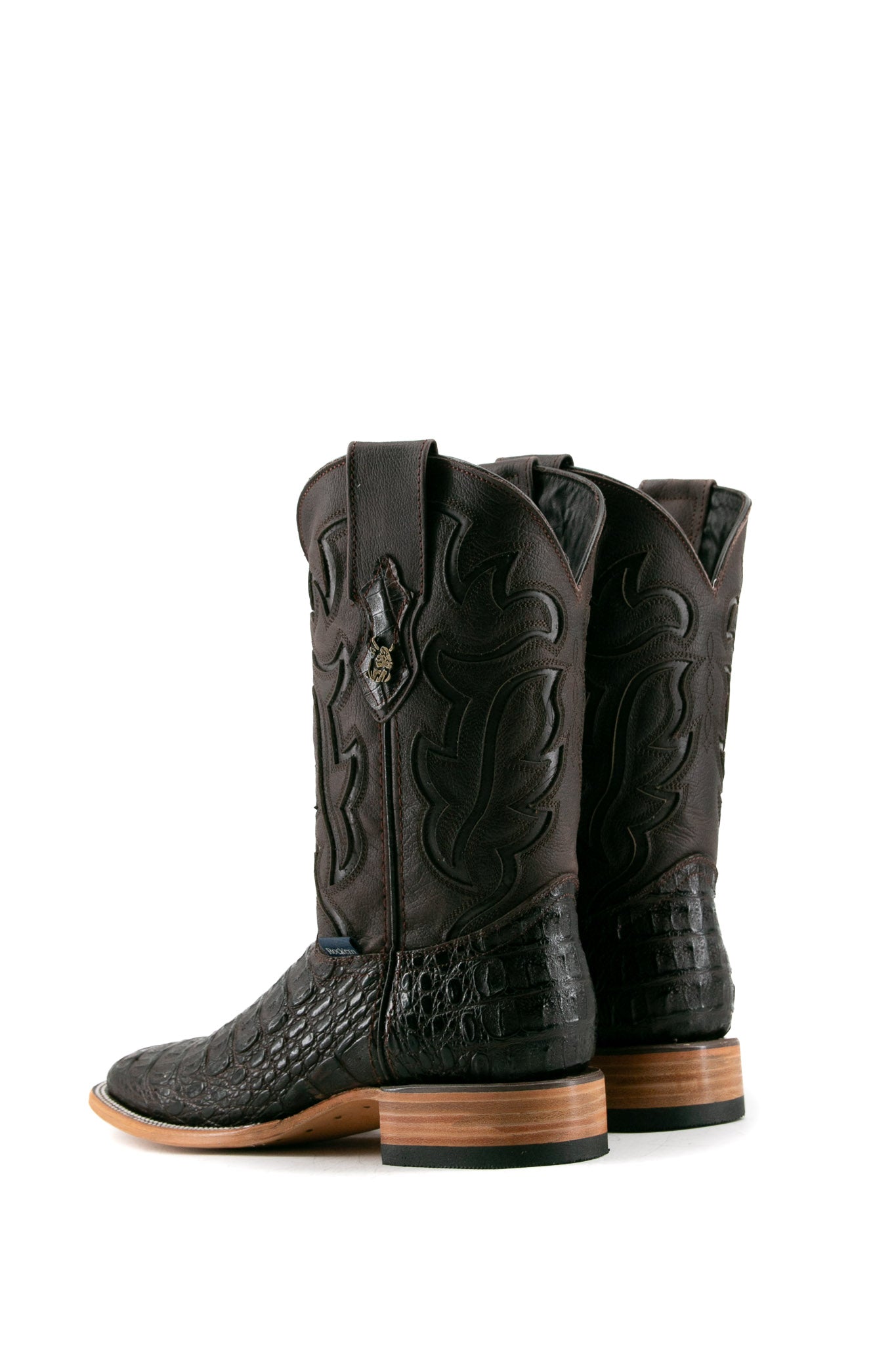 Back view of the brown Cody Caiman cowboy boots are genuine leather, featuring a square toe, caiman print vamp, brown embroidery shaft, rubber heel.