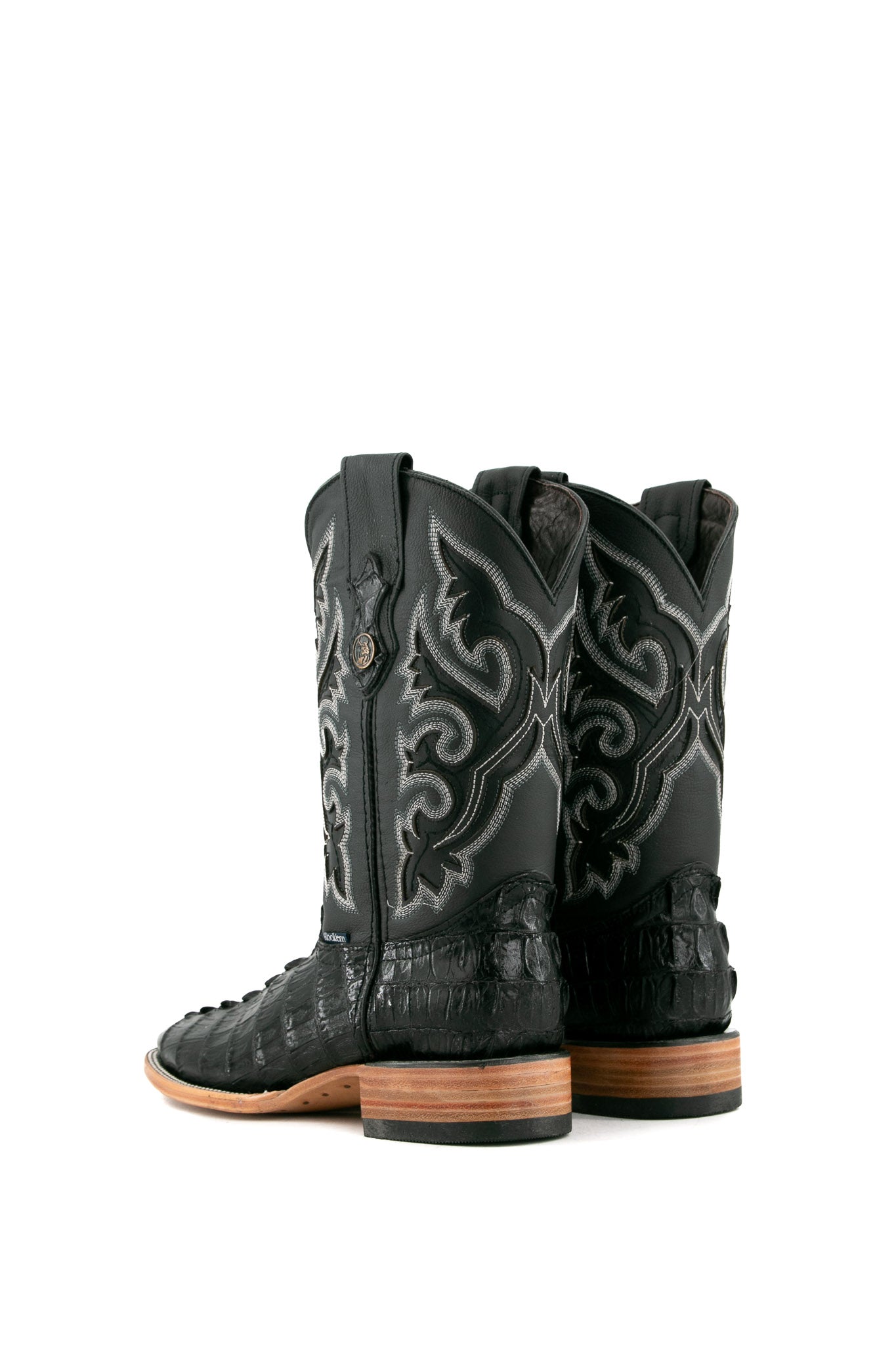 Back view of the black Caiman Tail cowboy boots are genuine leather, featuring a square toe, black caiman print vamp, black embroidery shaft, rubber heel.