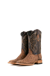 The Ostrich Matte Rustic boots in Rustic Honey with a square toe, ostrich quill texture, brown leather shaft with brown embroidery, and stacked heel