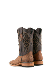 Back view of the Ostrich Matte Rustic boots in Rustic Shedron with a square toe, ostrich quill texture, brown leather shaft with brown embroidery, and stacked heel