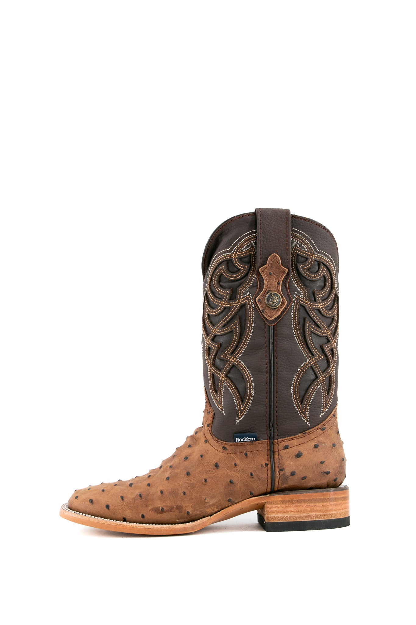 Side view of the Ostrich Matte Rustic boots in Rustic Honey with a square toe, ostrich quill texture, brown leather shaft with brown embroidery, and stacked heel
