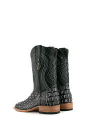 Back view of black safari Giant Caiman Hornback cowboy boots in genuine leather, featuring a square toe, black and white caiman print vamp, black shaft with white embroidery, and rubber heel.