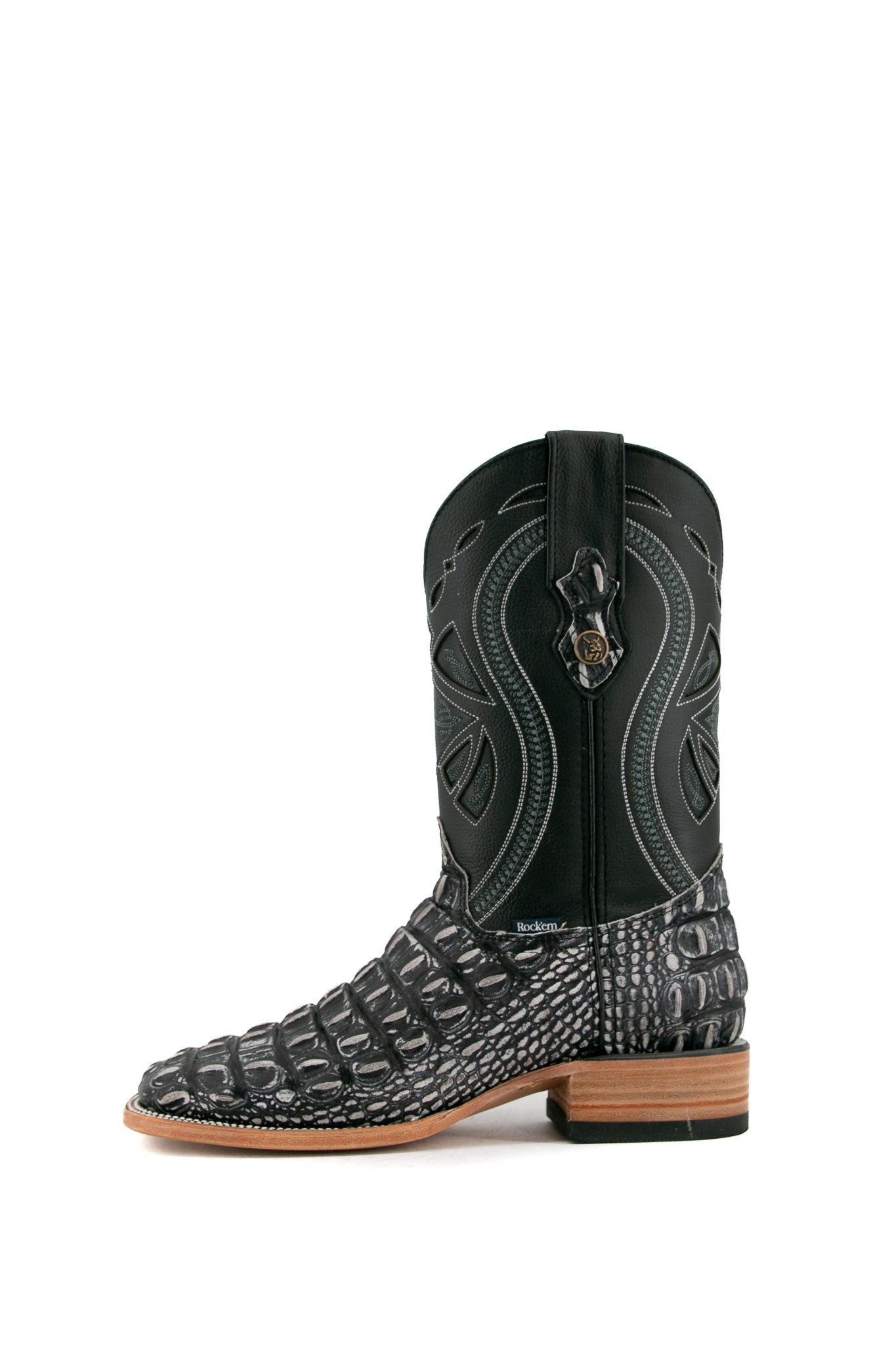 Side view of black safari Giant Caiman Hornback cowboy boots in genuine leather, featuring a square toe, black and white caiman print vamp, black shaft, and rubber heel.