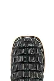 Top-down close-up of black safari Giant Caiman Hornback cowboy boot vamp, showcasing the black and silver caiman print detail and square toe.