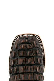 Top-down close-up of rustic brown Giant Caiman Hornback cowboy boot vamp, highlighting the brown and black caiman print detail and square toe.