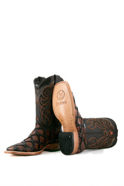 View of shedron Big Bass Pirarucu Cowboy Boot features genuine leather, square toe, shedron pirarucu print vamp, brown embroidered shaft, rubber heel, and tan sole.