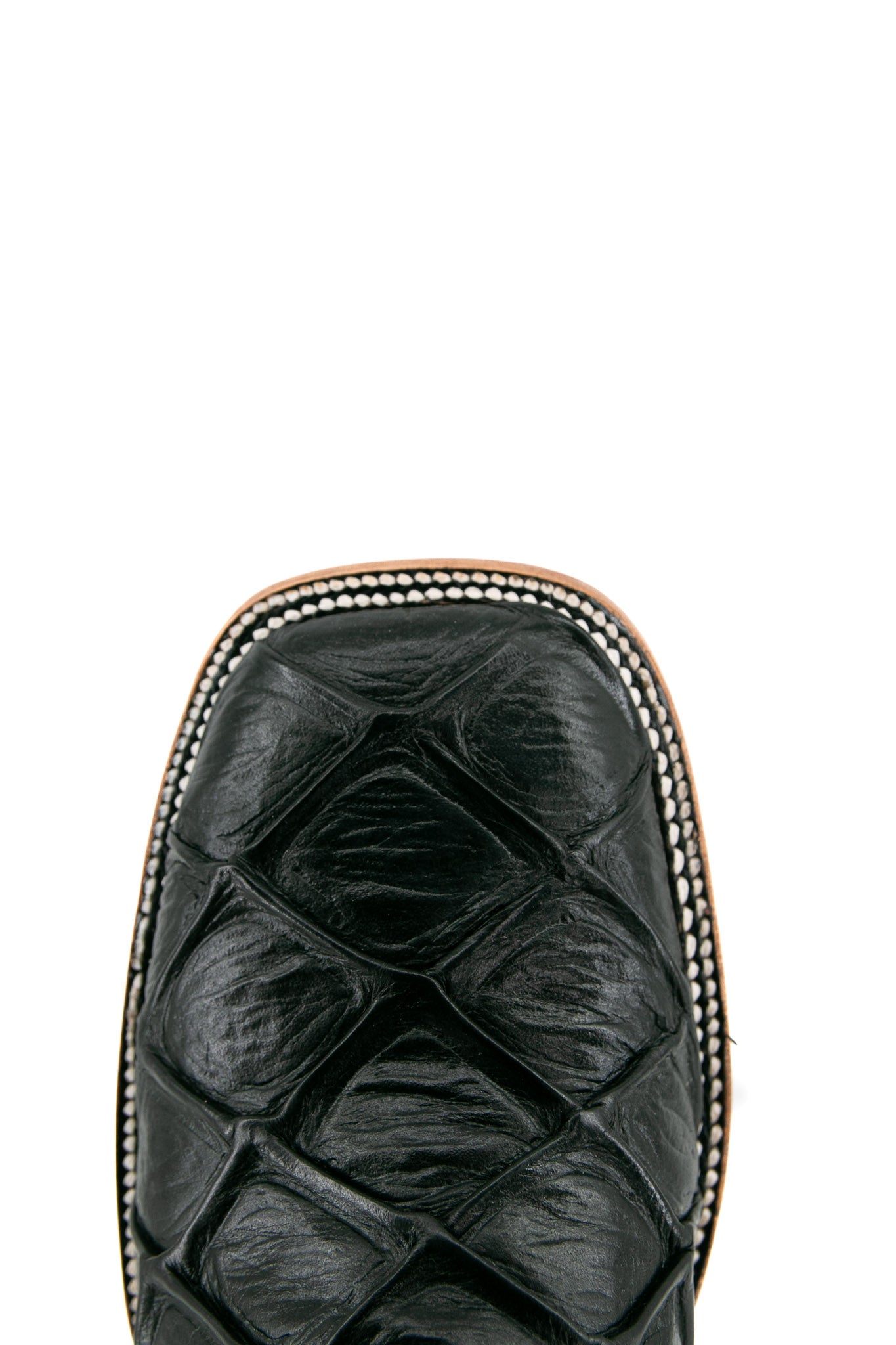 Top-down close-up of black Big Bass Pirarucu cowboy boot vamp, showcasing the black pirarucu print detail, double stitching and square toe.