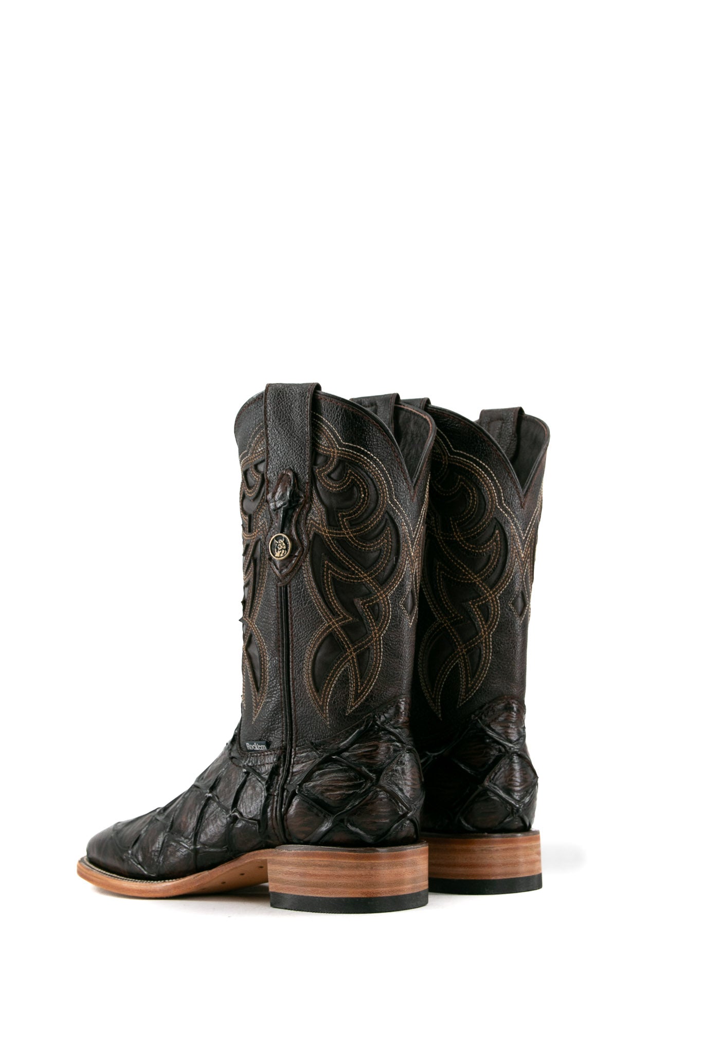 Back view of the brown shedron Big Bass Pirarucu Cowboy Boot in genuine leather, square toe, brown pirarucu print vamp, brown embroidered shaft, rubber heel, and tan sole.