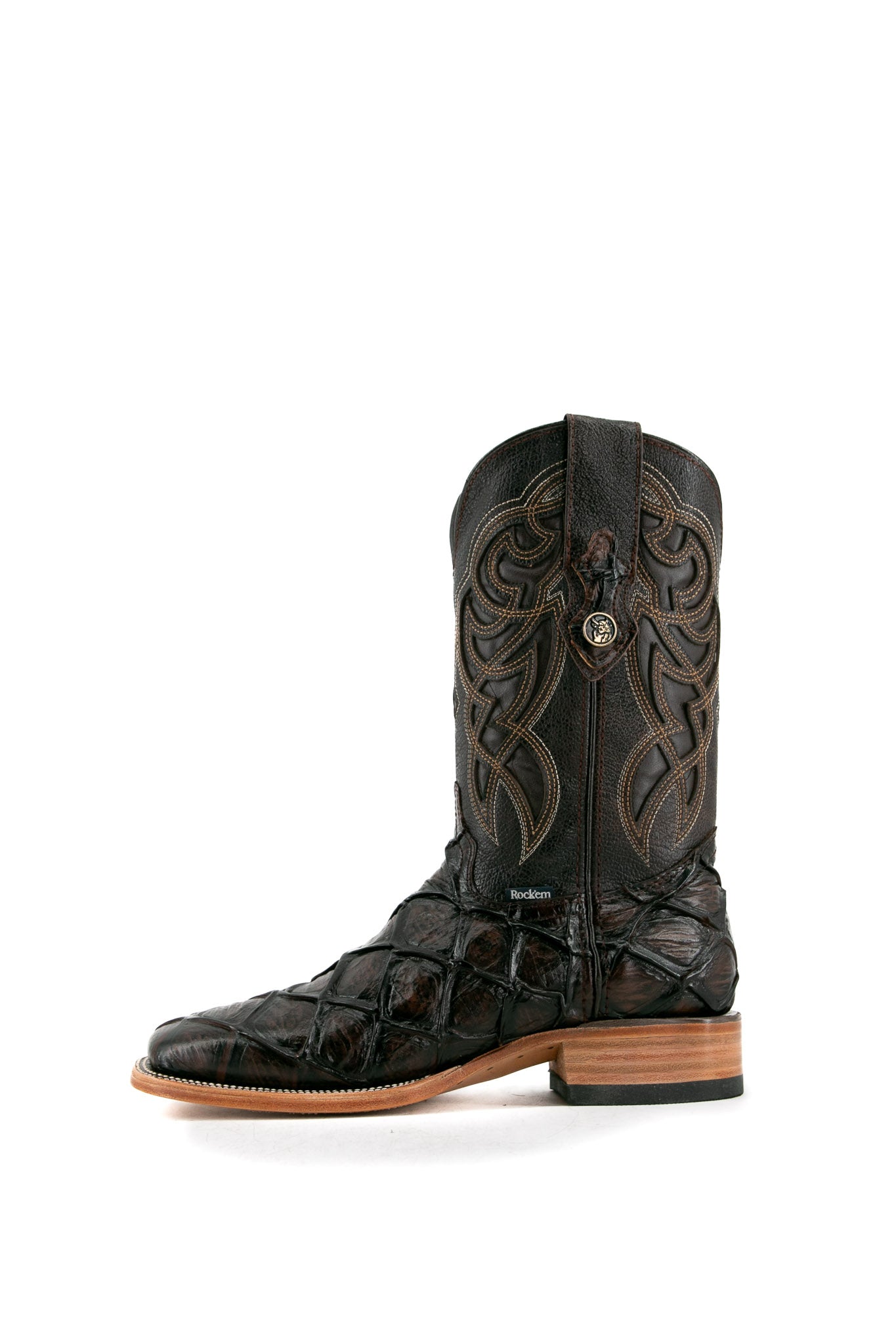 Side view of the brown shedron Big Bass Pirarucu Cowboy Boot in genuine leather, square toe, brown pirarucu print vamp, brown embroidered shaft, rubber heel, and tan sole.