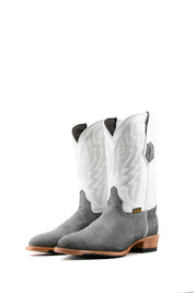 The Maverick boots feature a grey suede vamp, white shaft, round toe, sturdy leather sole, and rubber heel.