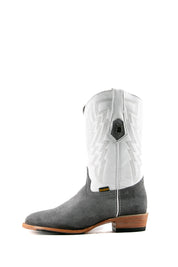 Side view of the Maverick boots feature a grey suede vamp, white shaft, round toe, sturdy leather sole, and rubber heel.