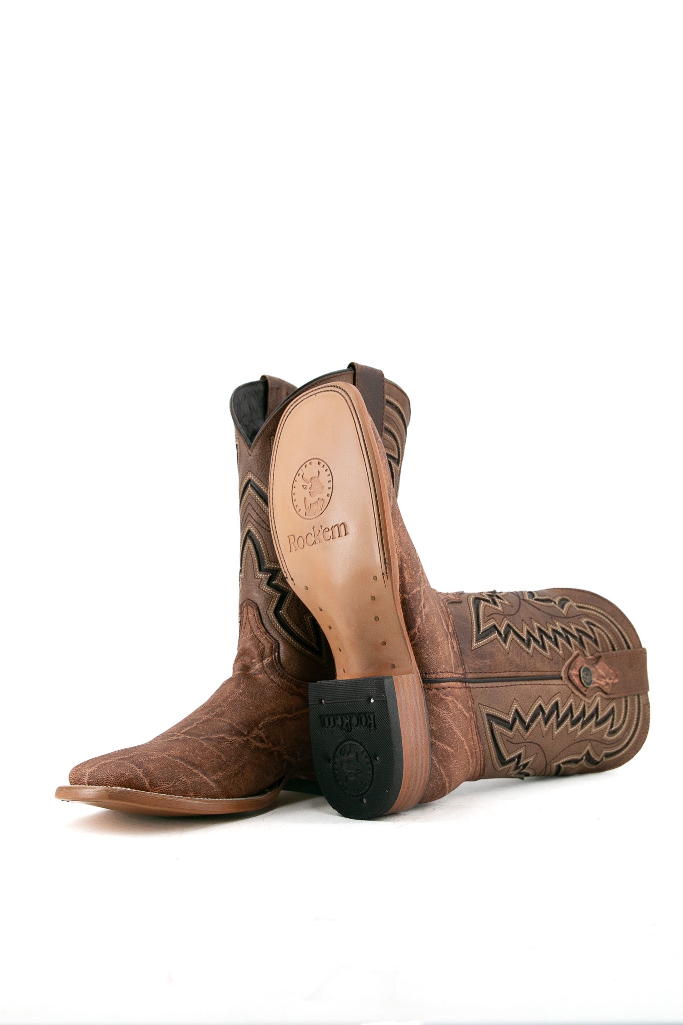 View of sand Rock'em Elephant cowboy boots in genuine leather, featuring a square toe, elephant print vamp, embroidered shaft, rubber heel, and tan leather sole.