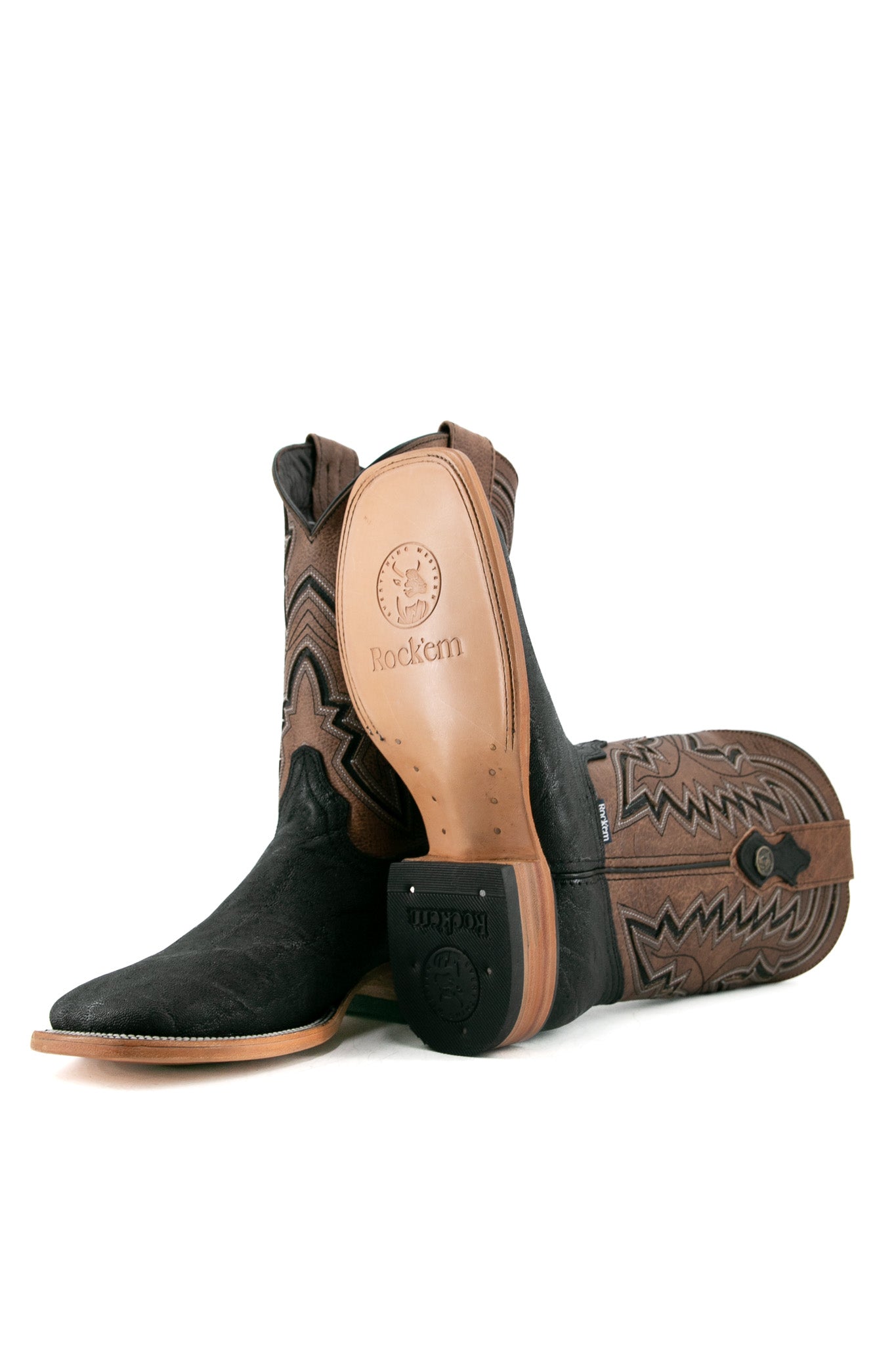 View of midnight Rock'em Elephant cowboy boots in genuine leather, featuring a square toe, elephant print vamp, embroidered shaft, rubber heel, and tan leather sole.