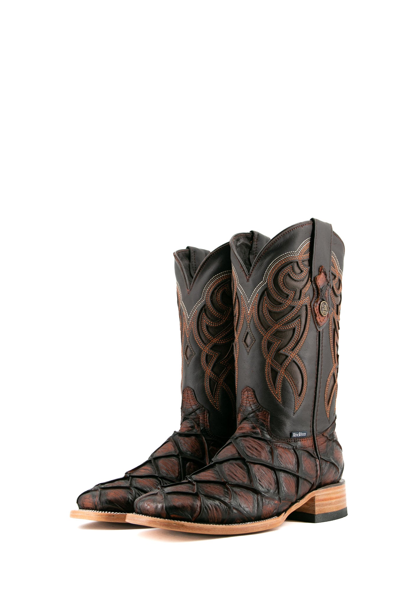 The Shedron Big Bass Pirarucu Matte cowboy boots are genuine leather, featuring a square toe, pirarucu print vamp, black embroidery shaft, rubber heel.