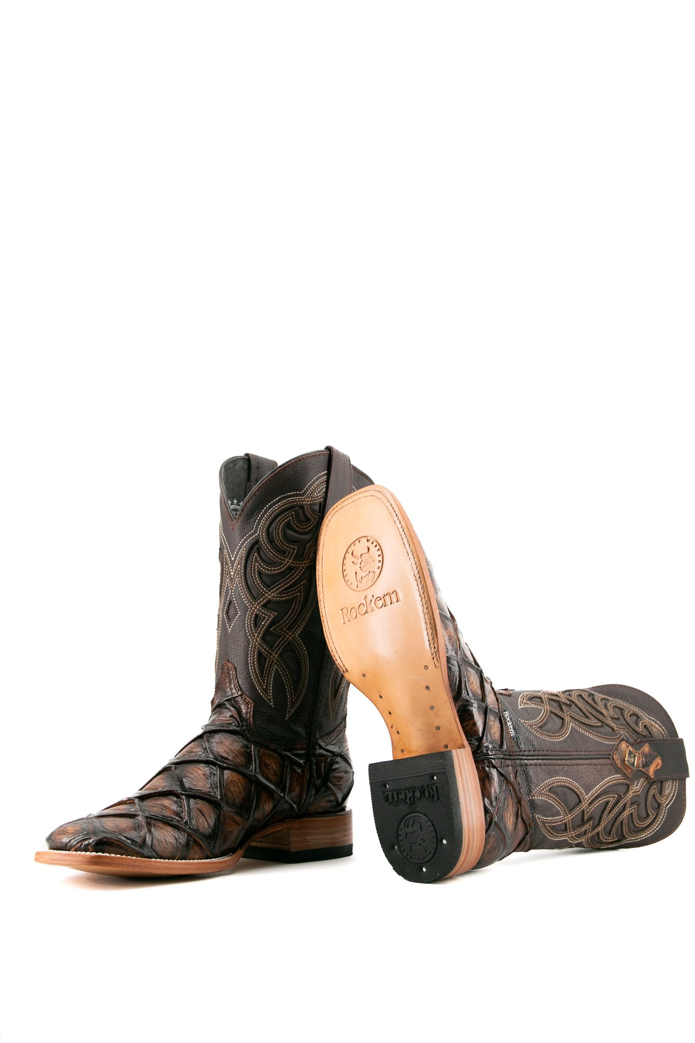 View of Honey Big Bass Pirarucu Cowboy Boot in genuine leather, square toe, honey pirarucu print vamp, brown embroidered shaft, rubber heel, and tan sole.