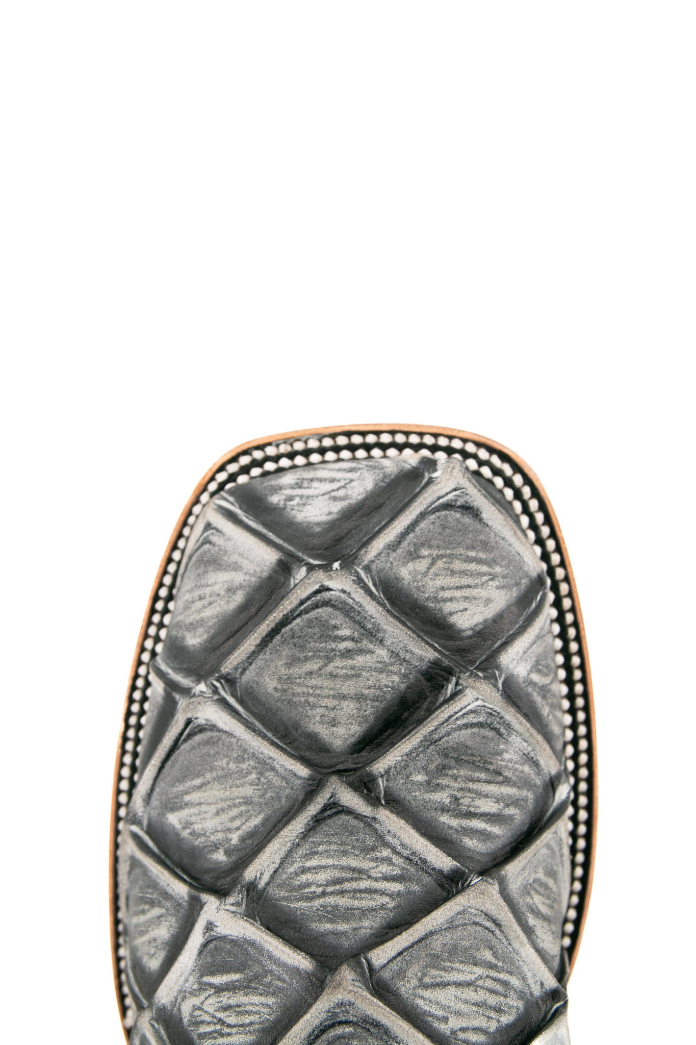Top-down close-up of granite safari Big Bass Pirarucu cowboy boot vamp, showcasing the gray pirarucu print detail, double stitching and square toe.