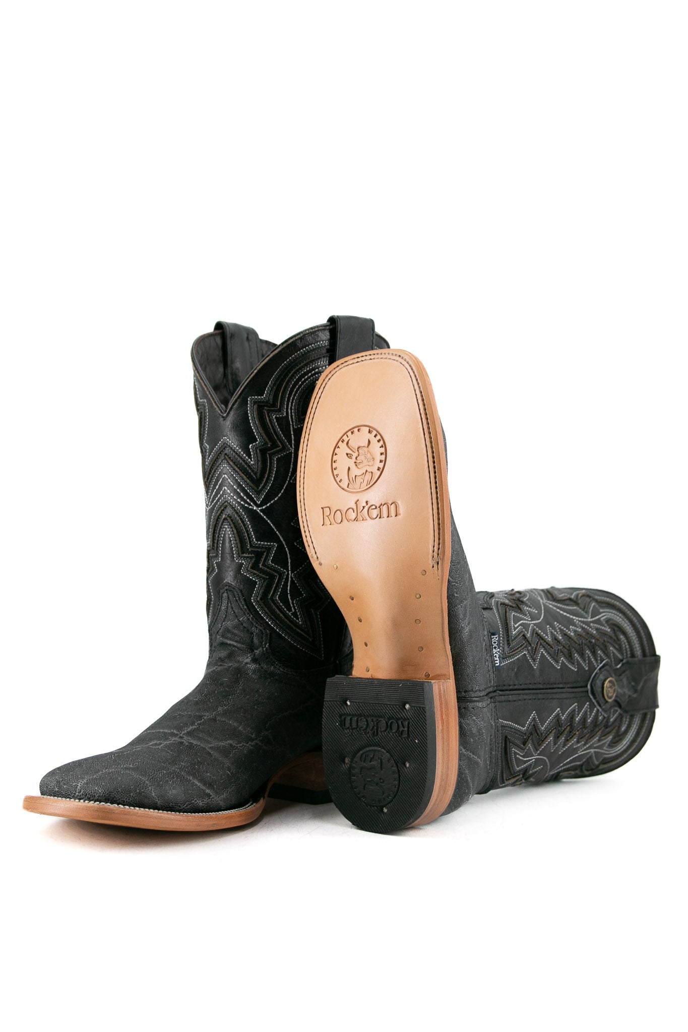 View of old silver Rock'em Elephant cowboy boots in genuine leather, featuring a square toe, Elephant print vamp, embroidered shaft, rubber heel, and tan leather sole.
