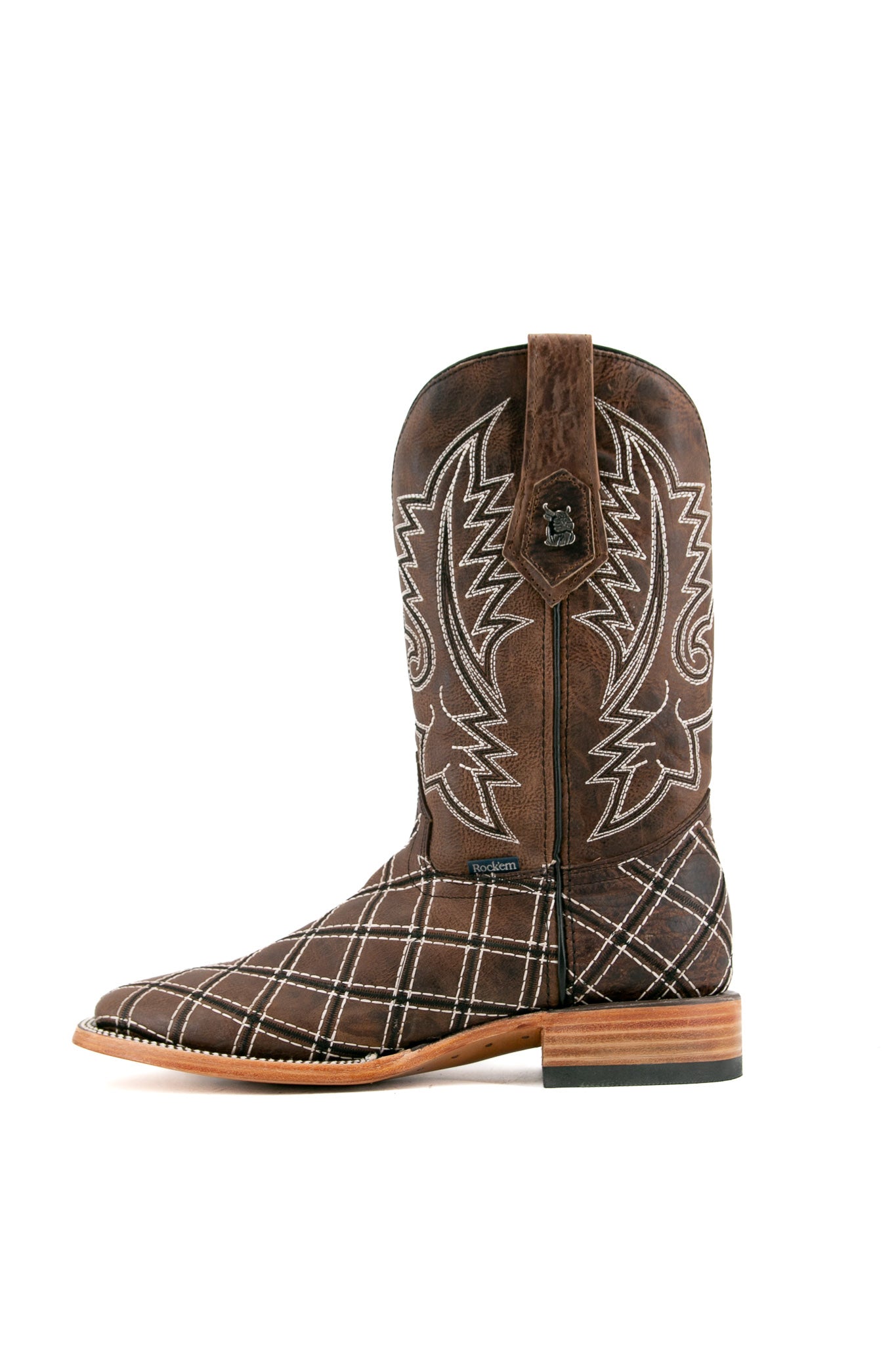 Side view of paja Roca Patchwork Cowboy Boot in genuine leather, square toe, brown roca patchwork print vamp, brown embroidered shaft, rubber heel, and tan sole.