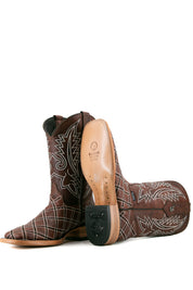 View of shedron Roca Patchwork Cowboy Boot in genuine leather, square toe, shedron roca patchwork print vamp, shedron embroidered shaft, rubber heel, and tan sole.