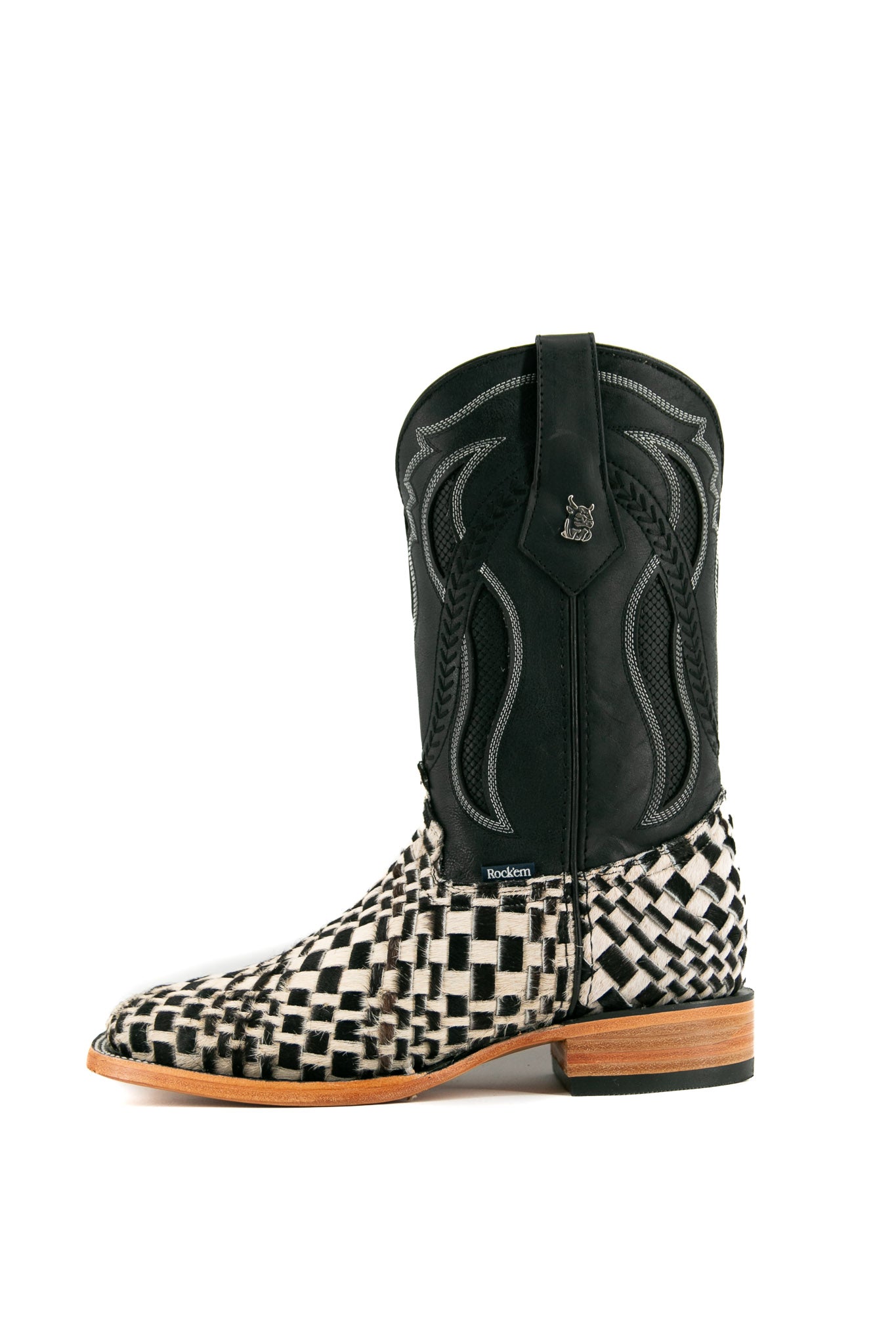 Rock'em Woven Cowhide boots feature a handwoven black & white vamp, black embroidered shaft, square toe, and a leather sole with a rubber heel.