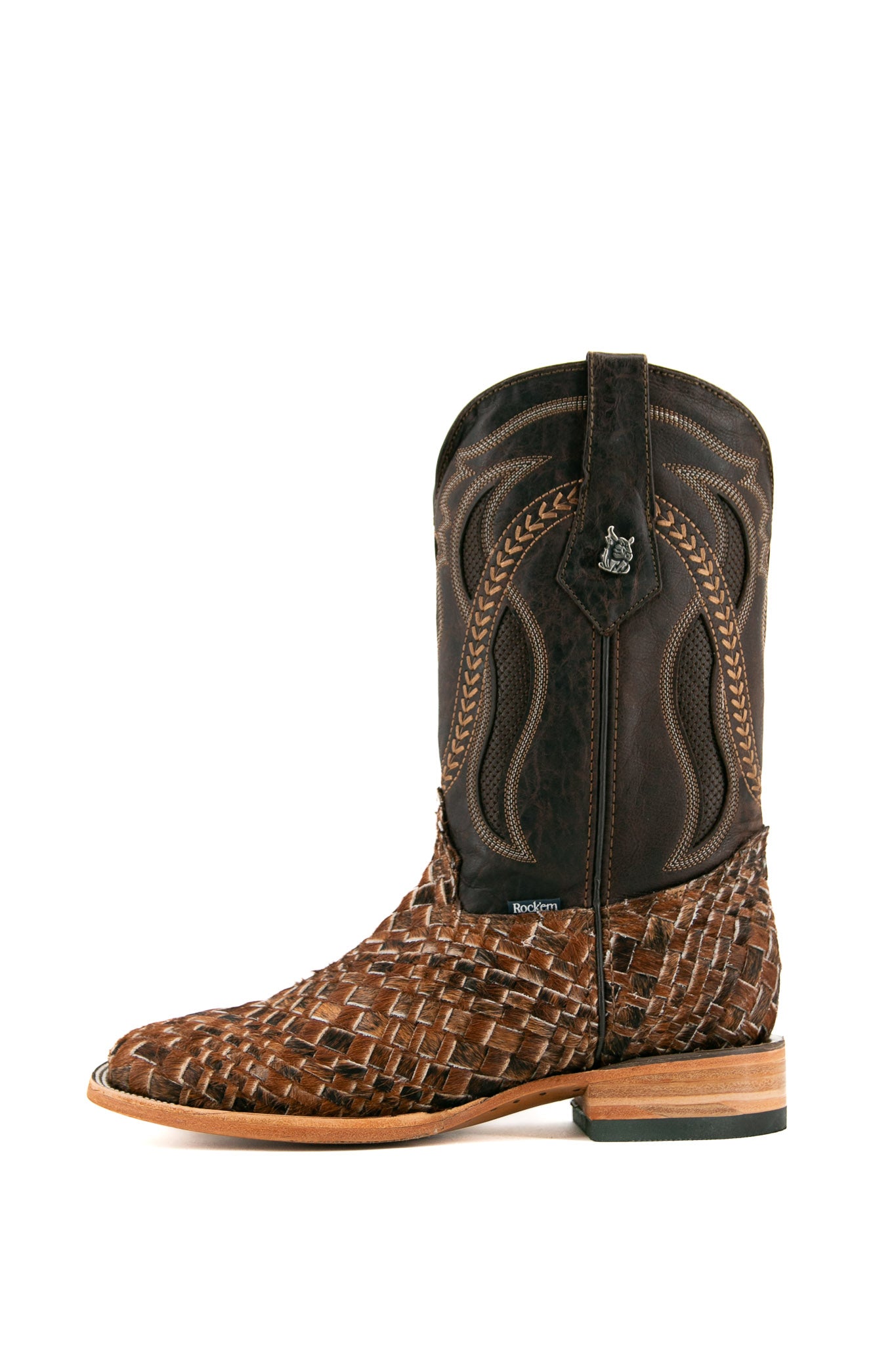 Rock'em Woven Cowhide boots feature a handwoven brown & black vamp, dark brown embroidered shaft, square toe, and a leather sole with a rubber heel.