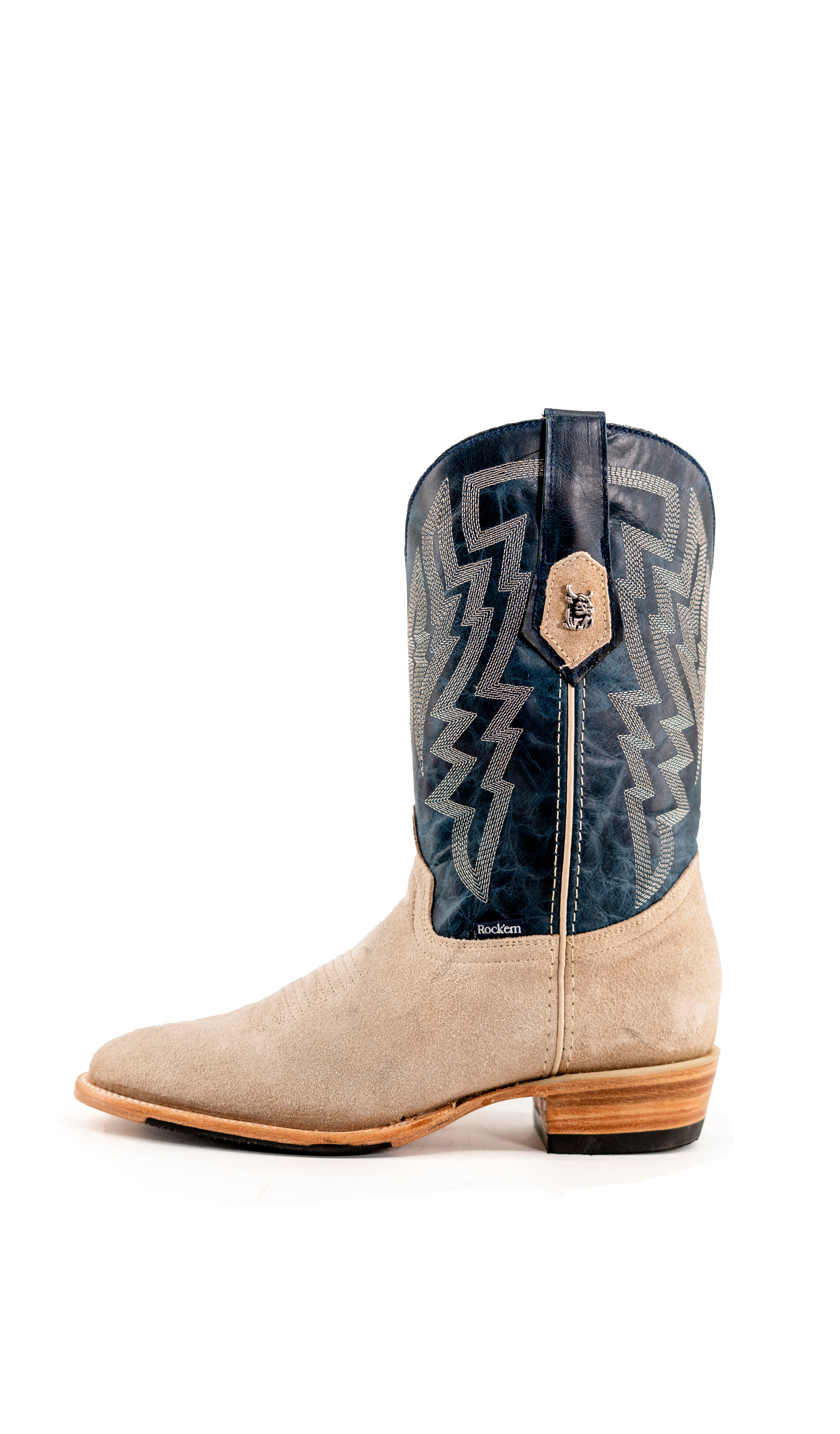 Side view of the Maverick boots feature a sand suede vamp, blue shaft, round toe, sturdy leather sole, and rubber heel.