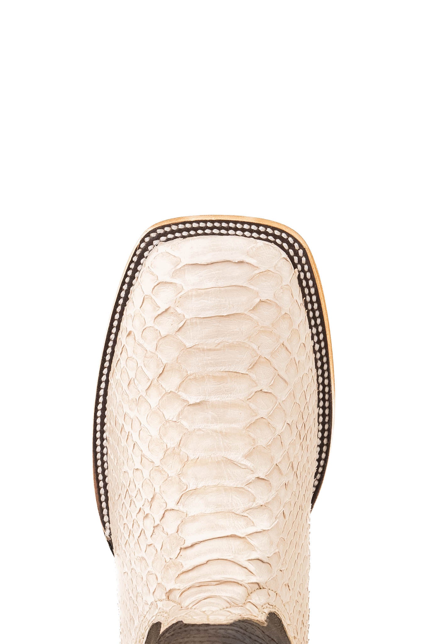 Top-down close-up of Andersen python exotic cowboy boot vamp, showcasing the matte white python print scale, double stitching and square toe.