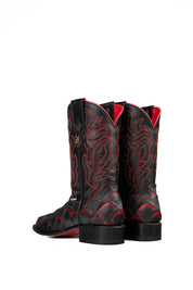 Back view of the Bruce Jumbo Fish boot features a red and black Pirarucu fish print vamp, a black leather shaft with red embroidery, a square toe, and black sole.