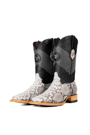The Andersen Python Exotic cowboy boots are genuine leather, featuring a square toe, white python print vamp, black shaft with tan embroidery, rubber heel, and a leather sole.