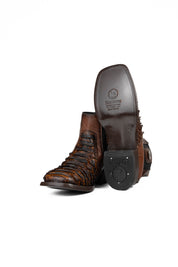 View of the Rock'em clan python boots in honey are genuine leather. Featuring a square toe, brown python print vamp, rubber heel, and a leather sole.