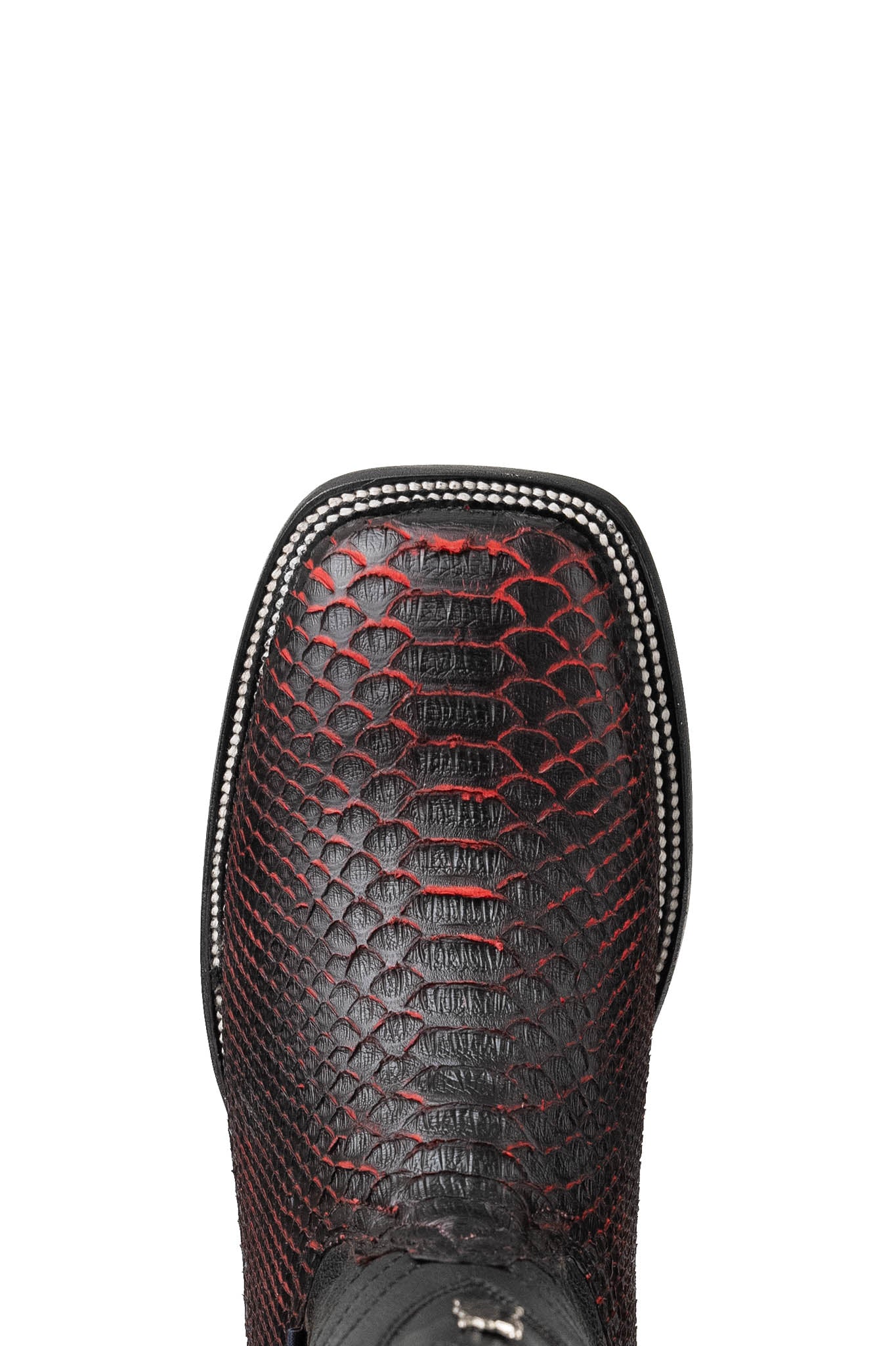 Top-down close-up of python exotic cowboy boot vamp, showcasing the black red tone under the python print scale, double stitching and square toe.