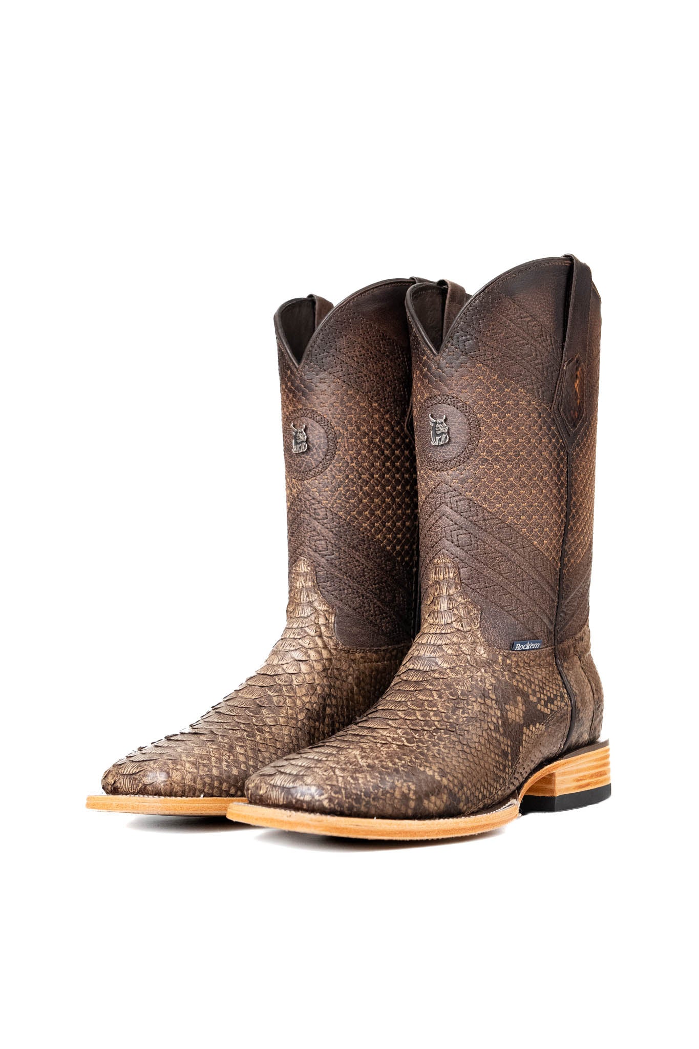 The Andersen Python Exotic cowboy boots are genuine leather, featuring a square toe, tan python print vamp, brown shaft with tan embroidery, rubber heel, and a leather sole.