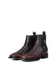 The Rock'em clan python boots in blackcherry are genuine leather. Featuring a square toe, black and red python print vamp, rubber heel, and a leather sole.