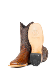 View of the Bruce Belly Caiman Cowboy Boots in honey are made of genuine leather with a round toe, a honey color belly caiman print vamp, brown embroidered shaft, and leather sole.