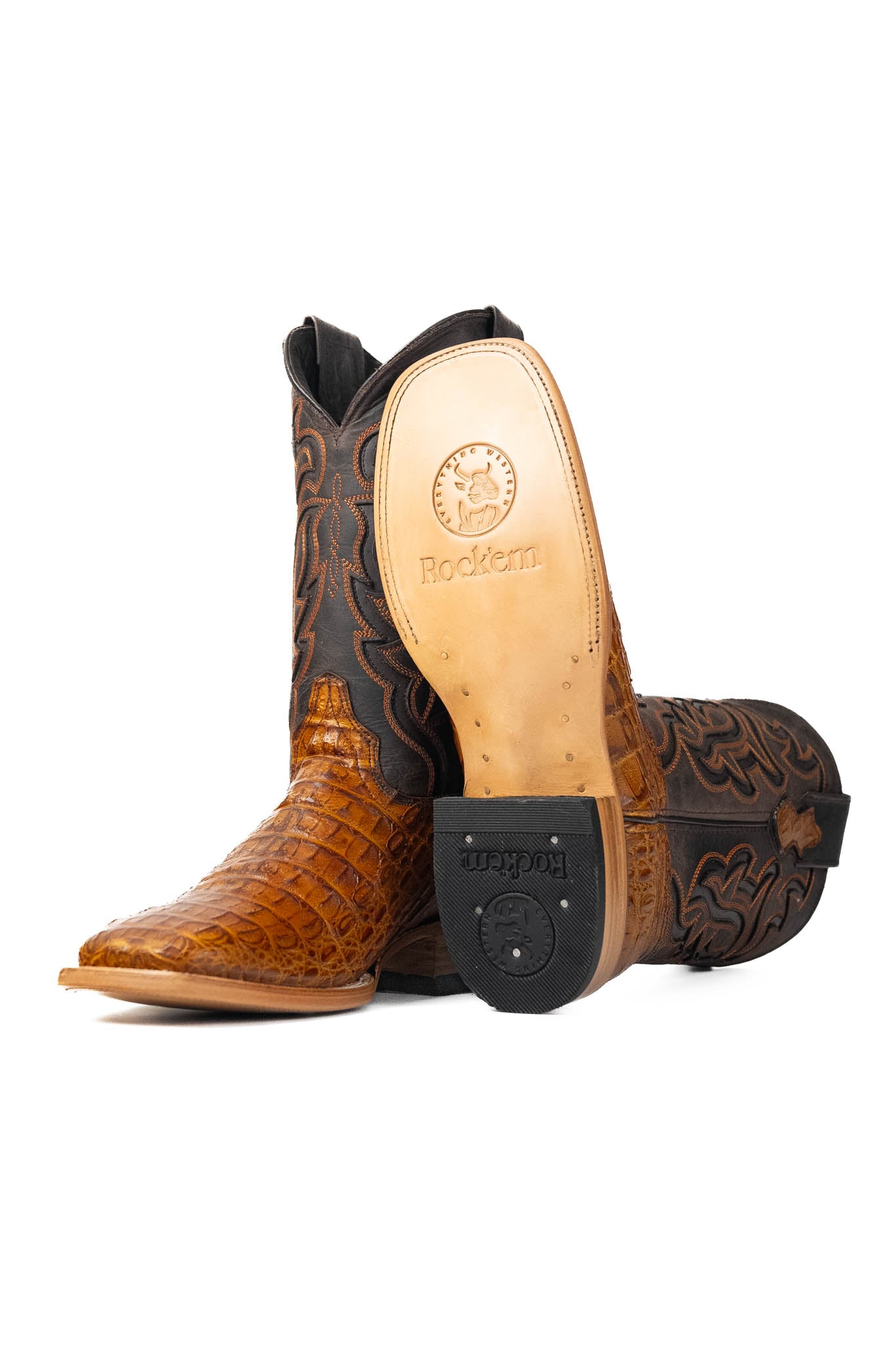 View of buttercup Cody Caiman cowboy boots in genuine leather, featuring a square toe, caiman print vamp, buttercup embroidered shaft, tan leather sole, and rubber heel.