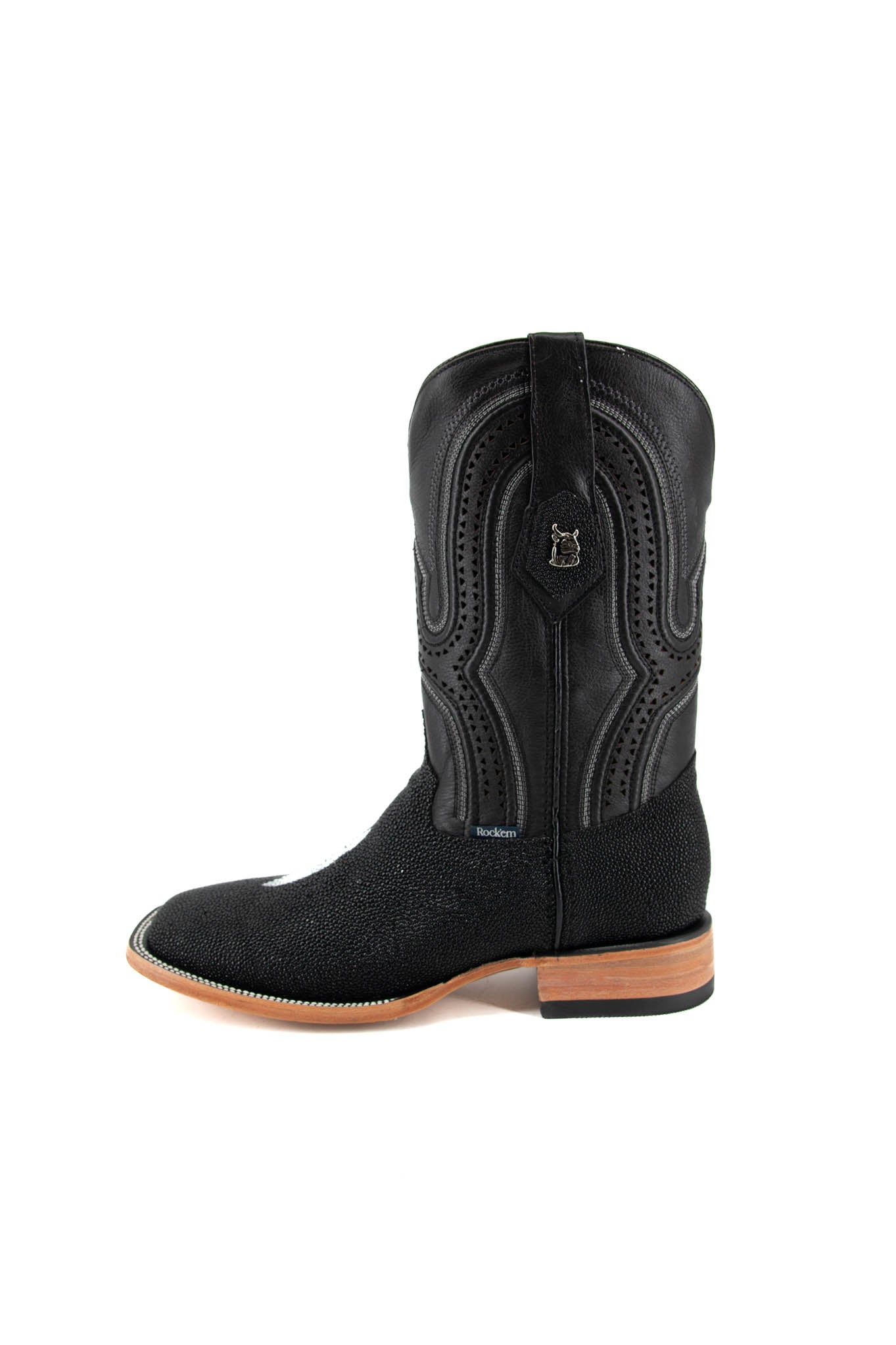 Side view of the Barnet Stingray Exotic in an all-black cowboy boot crafted from genuine leather. It showcases a square toe, an exotic stingray vamp with pebbled texture and a white diamond-shaped marking in the middle, embroidered leather shaft, rubber heel, and leather sole.
