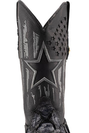 Closer view of the front shaft in smooth black leather, featuring a patchwork design with a star and star-shaped perforations.