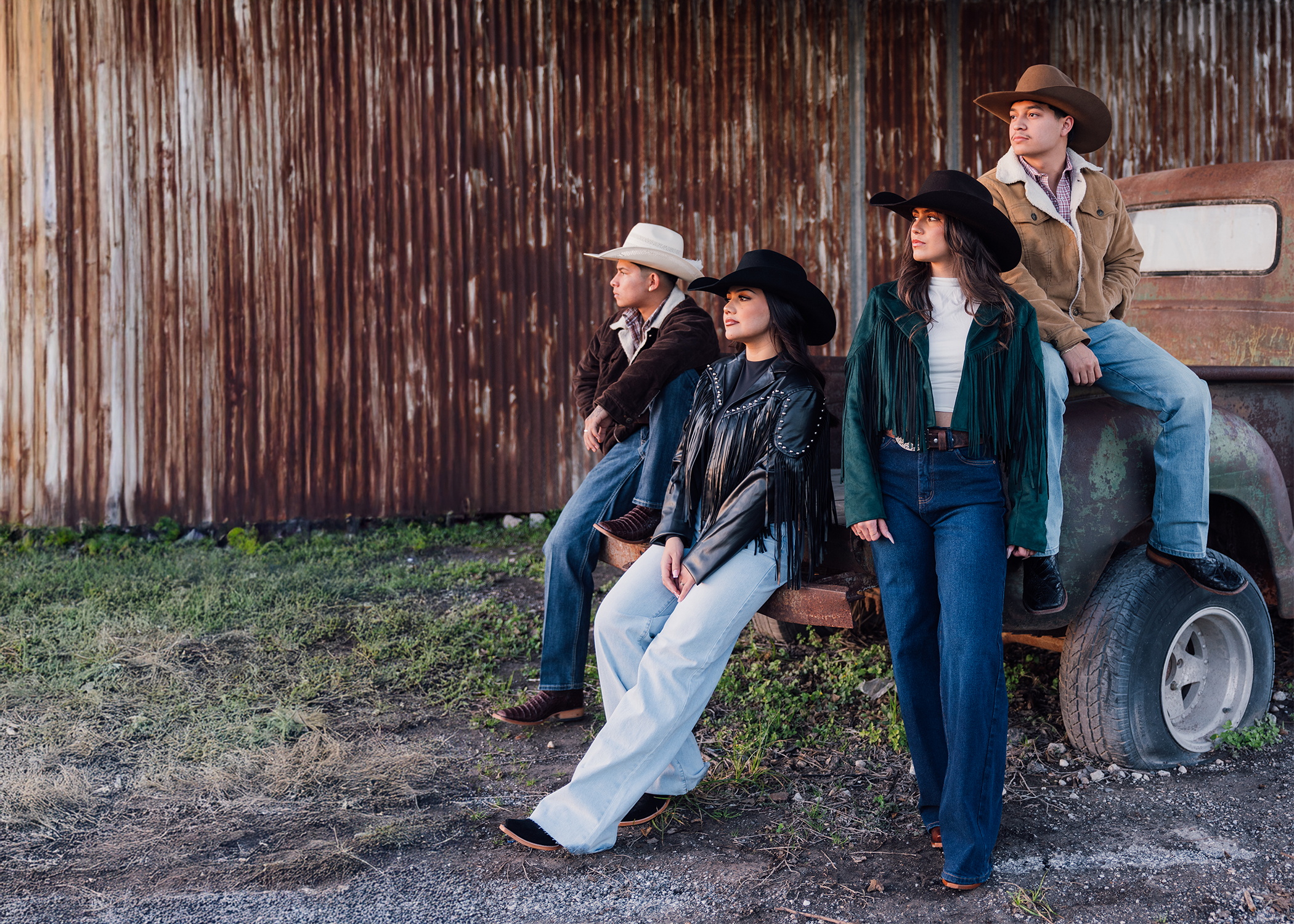 Group of people wearing cowboy boots and denim jeans