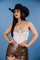 A cream strapless suede bustier tube top featuring western-style embroidery with floral and arrow motifs, and a button-up front with metallic round decorative buttons.