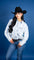 Close up view of a woman wearing a white and blue stripped long sleeve shirt with pearl snaps.