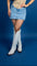 Close-up view of a woman wearing a high rise denim skort.