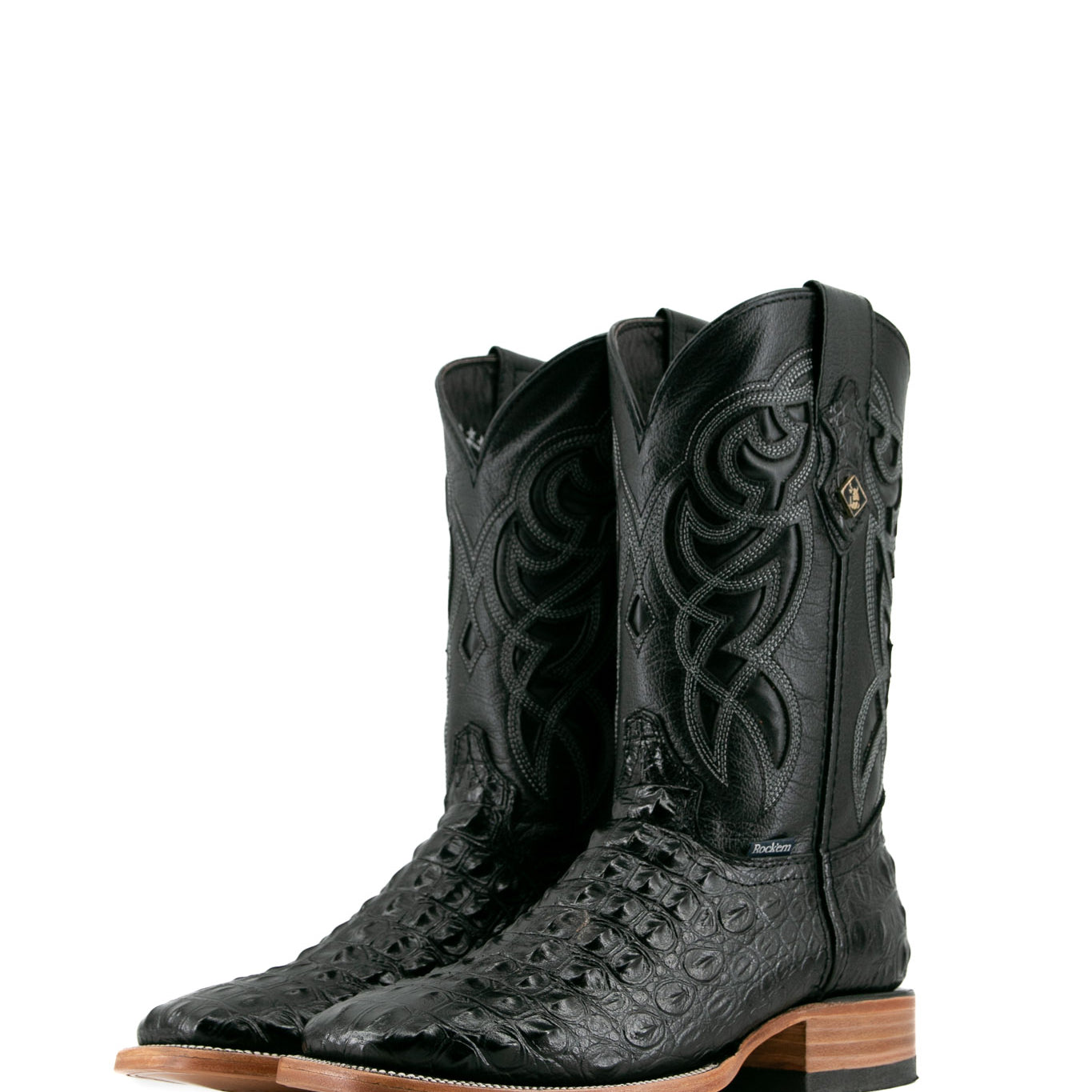 Black Caiman Hornback cowboy boots are genuine leather, featuring a square toe, caiman print vamp, black embroidery shaft, rubber heel.