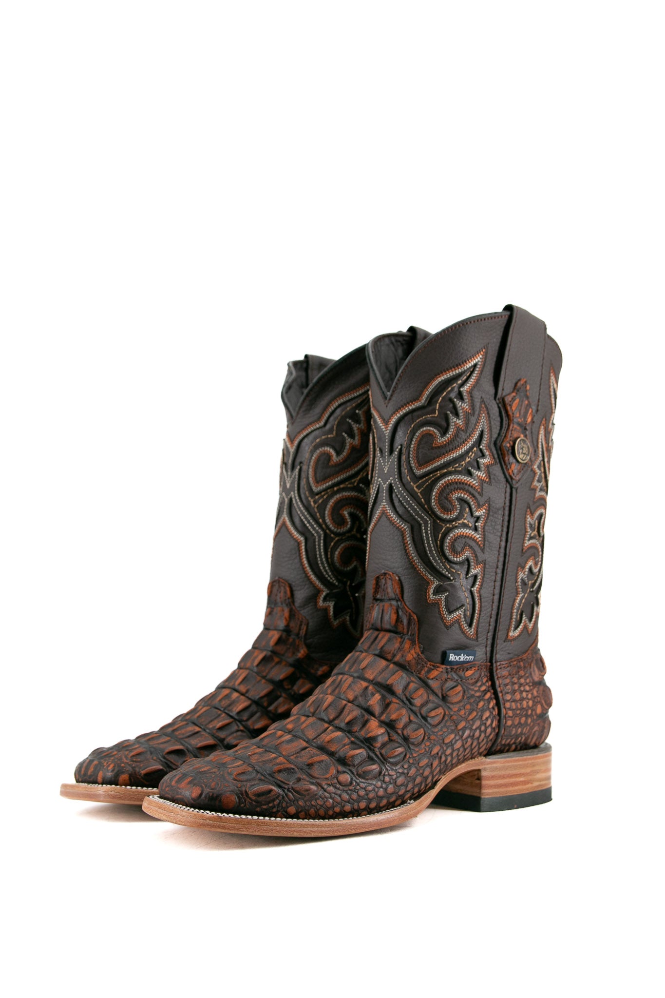 The rustic shedron Giant Caiman Hornback cowboy boots are genuine leather, featuring a square toe, shedron caiman print vamp, brown shaft with embroidery, rubber heel. 
