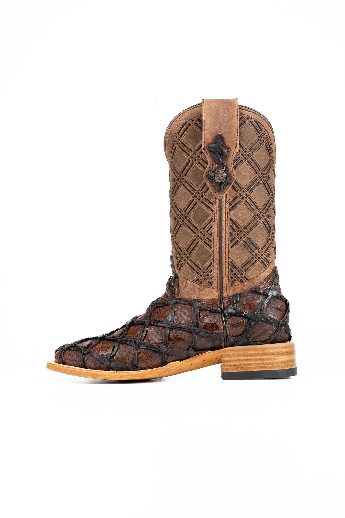 The Bradley boot features a brown Pirarucu fish print vamp, a brown leather shaft with a laser-cut pattern, a square toe, and a natural-tone sole.