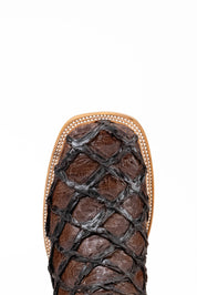 The Bradley boot features a brown Pirarucu fish print vamp, a brown leather shaft with a laser-cut pattern, a square toe, and a natural-tone sole.